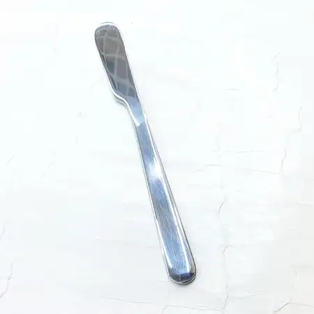 #1010201-51; Stainless Steel butter knif..