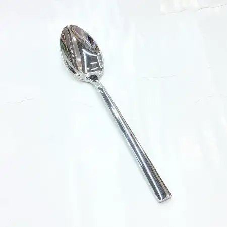 #1194-2; Stainless steel dinner spoon..