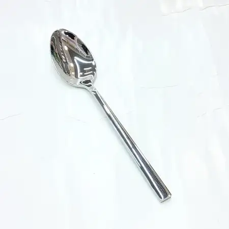 #1194-3: Stainless steel dessert spoon..