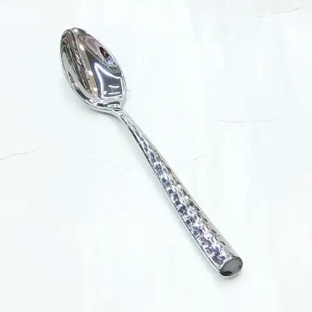 #1206-3; Stainless steel dessert spoon..