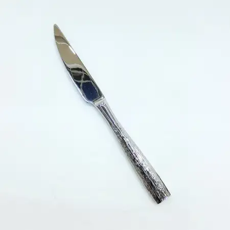 #1209-26; Stainless steel steak knife..