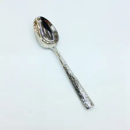 #1209-4; Stainless steel tea spoon..