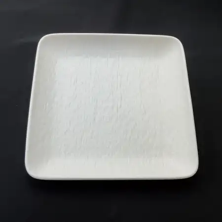 #BS5156-WT; Ceramic 17.5cm square plate..